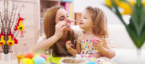 young woman playing to the kid